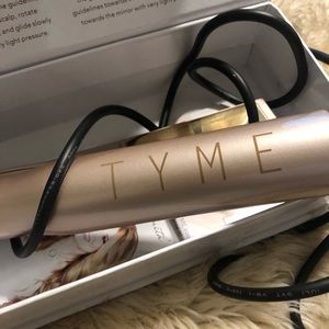 Tyme hair iron for curling and straitening.